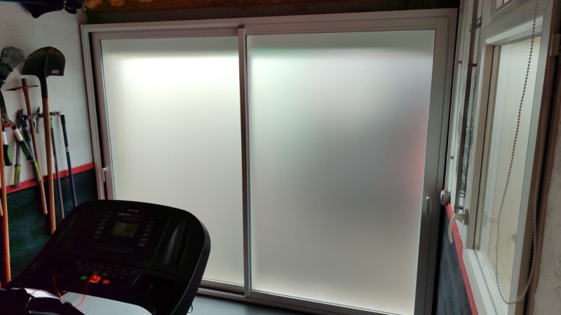 Installation d’un coulissant 2 vantaux en remplacement d’une porte de garage 