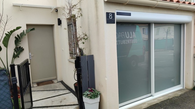Installation d’un coulissant 2 vantaux en remplacement d’une porte de garage 